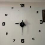 A creative and fashionable 3D Wall Clock DIY 12-hour display.